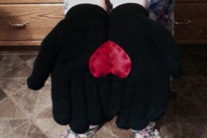 Made some gloves holding a heart. Super cute.